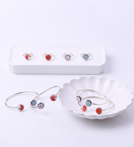 Dagwa collection rings and open bangles with colorful dasik motifs